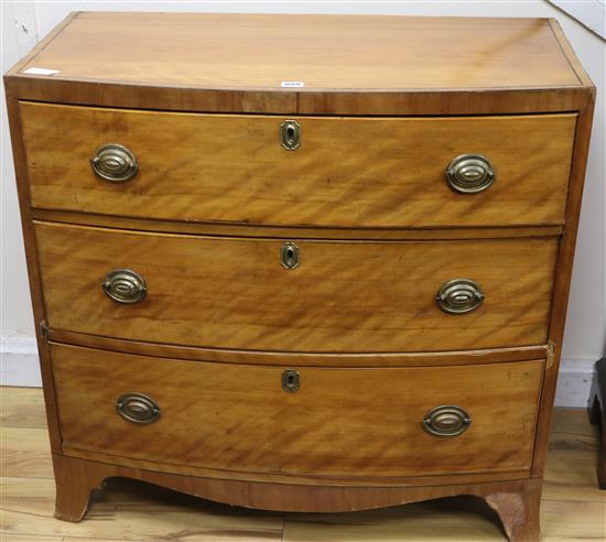 An early 19th century satinwood bowfront chest, W.86cm